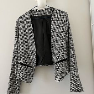 Cropped black and white diamond print blazer. NWOT.